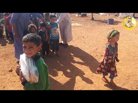ALMANYA'DAN HAMA'DAN KURTULANLARA 1100 EKMEKLE DESTEK