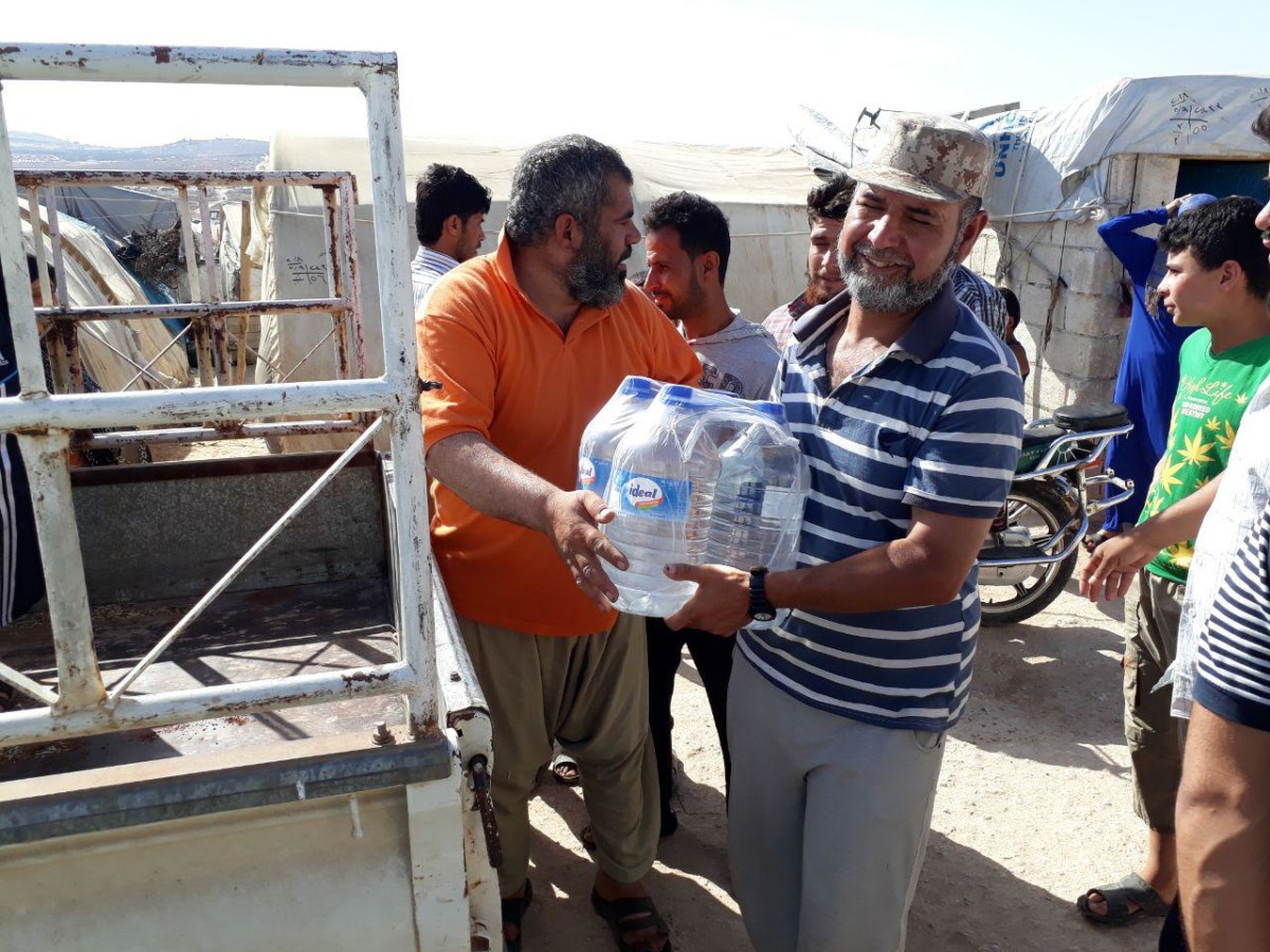 Savaş bölgelerinde su dağıtımı Suriye 04