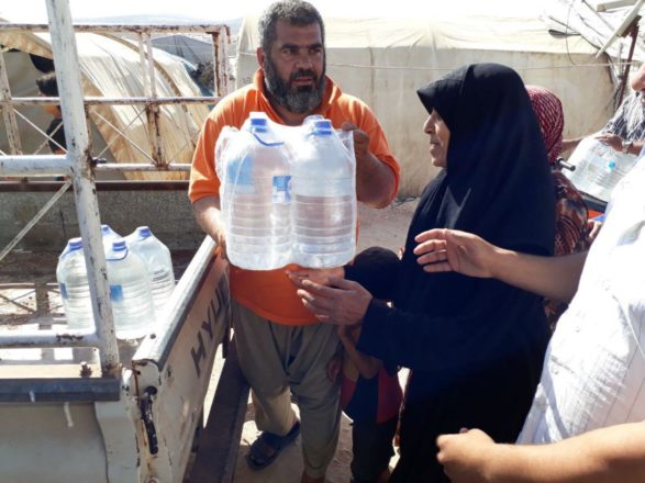 Savaş bölgelerinde su dağıtımı Suriye 29