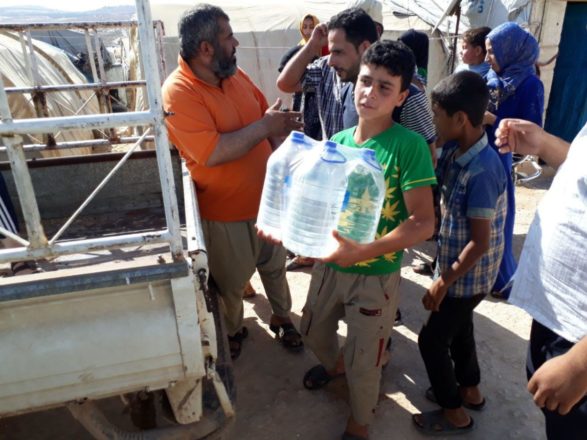 Savaş bölgelerinde su dağıtımı Suriye 34