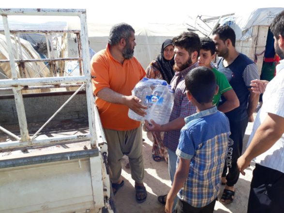 Savaş bölgelerinde su dağıtımı Suriye 36