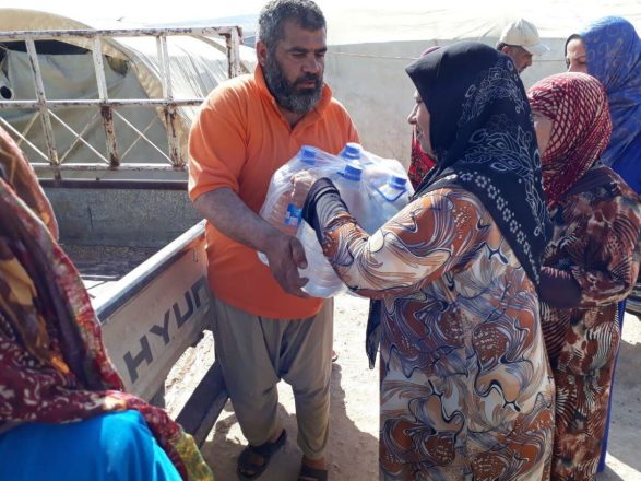 Savaş bölgelerinde su dağıtımı Suriye 30
