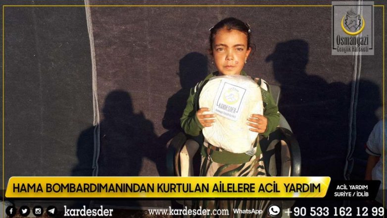 Evleri bombalanmış Müslüman kardeşlerimize ekmek dağıtımı 11