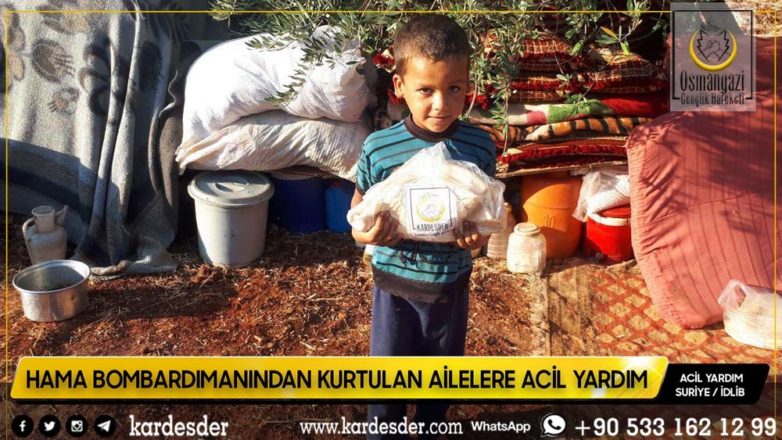 Evleri bombalanmış Müslüman kardeşlerimize ekmek dağıtımı 20