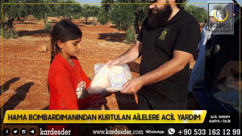 Evleri bombalanmış Müslüman kardeşlerimize ekmek dağıtımı 27