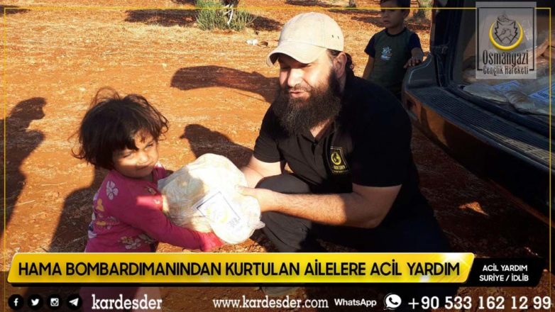 Evleri bombalanmış Müslüman kardeşlerimize ekmek dağıtımı 29