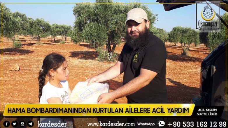 Evleri bombalanmış Müslüman kardeşlerimize ekmek dağıtımı 34