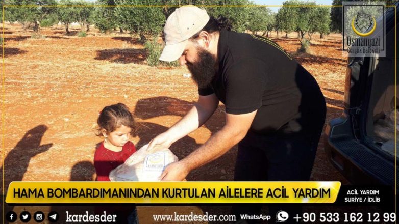 Evleri bombalanmış Müslüman kardeşlerimize ekmek dağıtımı 36