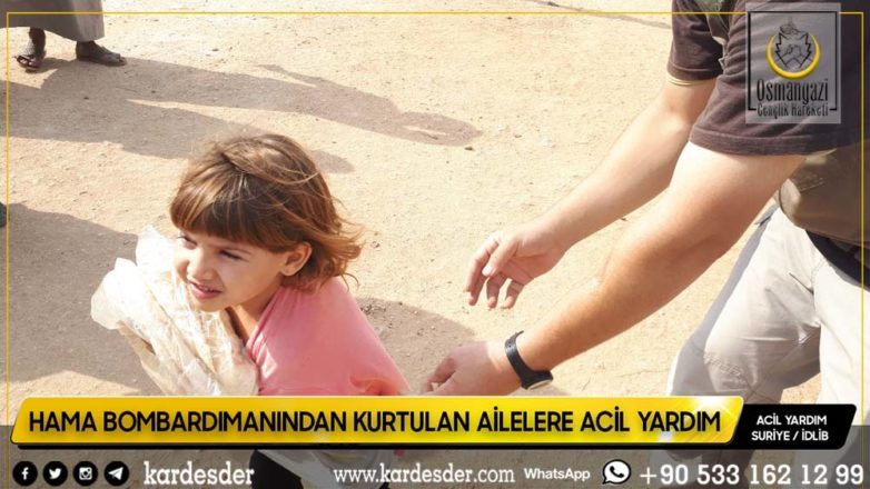 Hama bombardımanından kurtulup Atme kırsalına yerleşen mazlum halka ekmek dağıtımı 09