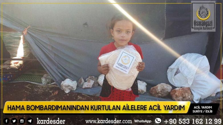 Evleri bombalanmış Müslüman kardeşlerimize ekmek dağıtımı 09