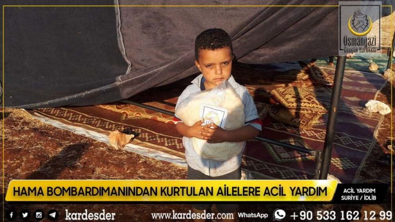 Evleri bombalanmış Müslüman kardeşlerimize ekmek dağıtımı 10