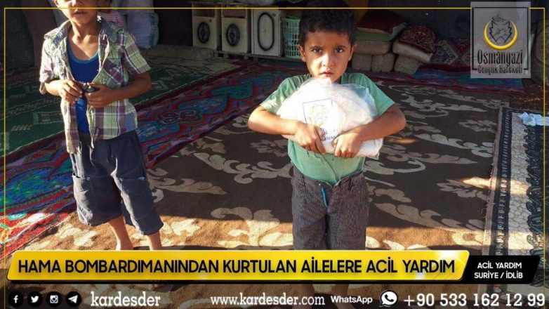Evleri bombalanmış Müslüman kardeşlerimize ekmek dağıtımı 23
