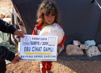 hama bombardimanindan kurtulanlara ekmek yardimi 01