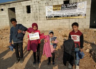 yoksul ve yetim cocuklar icin kislik bot ve mont yardimi 01