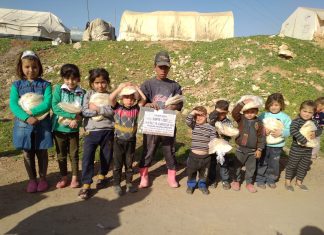 azerbaycan daki muslumanlardan yetimlere ekmek ikrami 28