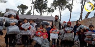 azerbaycan daki muslumanlardan yetimleri isitan yardim 01