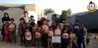 Cadirlarda Kalan Yetimlerimize Ekmek Dagitimi