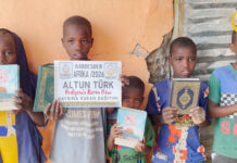 Kur’an Hediyen Afrika’da Bir Çocuğun Elinde Kur’an Hediyen Afrika’da Bir Çocuğun Elinde — 46